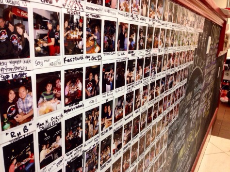 Wall of Fame: Polaroids of customers are put up on the wall.